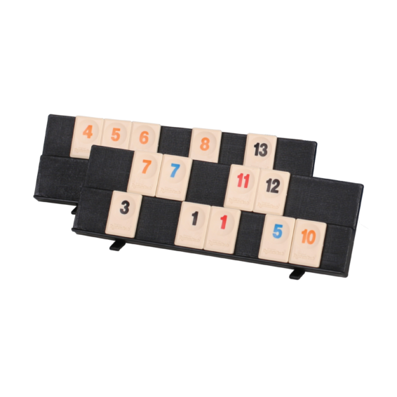 De plankjes en de stenen van het strategische reis spel Rummikub Travel Tin